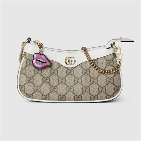 Gucci Mini borsa a spalla GG con ciondolo